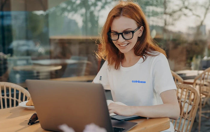 Female employee working on laptop