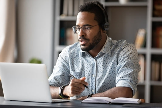 An employee works from home using gifts from his employer